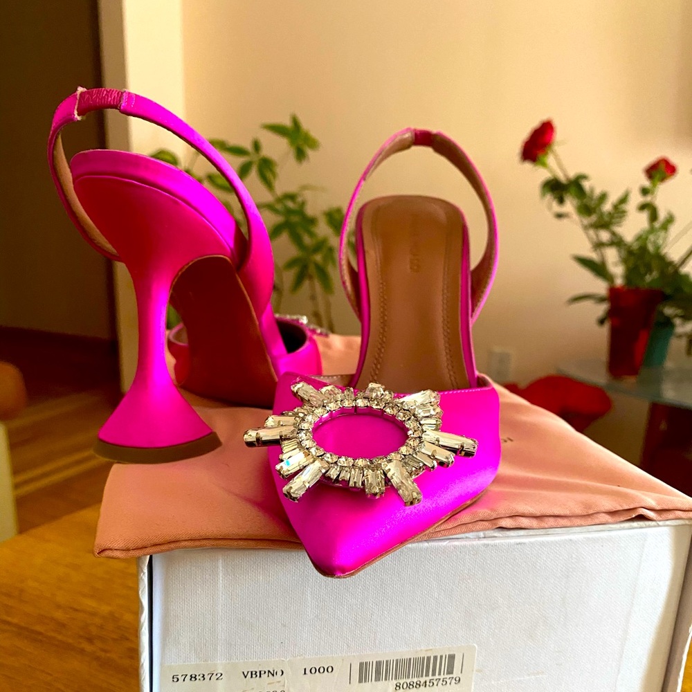 Beautiful pink heels. Very comfortable with a wide heel.